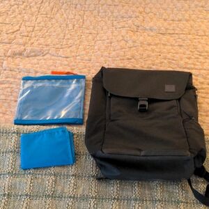 Black Backpack with Blue Accessories